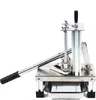 A stainless steel vertical potato chip and vegetable slicer with a tray. Náhled obrázku produktu