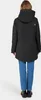 A woman wearing a black parka and blue jeans, viewed from the back. Produktbild-Vorschau