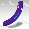 A purple phone case is shown in a dynamic pose with feathers floating around it, suggesting lightness and protection. Produktbild-Vorschau