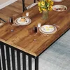 A dining table set for a meal with food and drinks. Produktbild-Vorschau