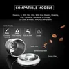 A stainless steel coffee capsule and its lid are shown with coffee beans falling around them, against a black background. Text describes compatible models and product features. Náhled obrázku produktu