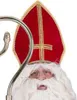 A close-up of a person dressed as Saint Nicholas, wearing a red and gold bishop's mitre and a white beard. Anteprima dell’immagine prodotto