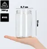 A hand holding a glass jar with dimensions indicated. Podgląd zdjęcia produktu