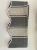 A folded awning valance with a striped pattern. Produktbild-Vorschau