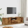 A living room scene featuring a TV stand with a television mounted above it. Náhled obrázku produktu