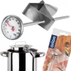 A kitchen thermometer with a clip, shown with a pot and packaging. Voir les images du produit