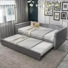A grey daybed with a pull-out trundle bed, set up in a room with curtains and wall art. Produktbild-Vorschau