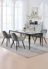 A dining room scene with a table and chairs. Produktbild-Vorschau