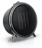 A black and silver ceramic heater with a round grille and three legs, shown on a white background. Produktbild-Vorschau