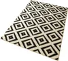 A rug with a diamond pattern is shown from a diagonal angle on a white background. Podgląd zdjęcia produktu