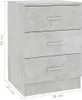 A close-up, slightly angled view of a three-drawer bedside table with a concrete-like finish. Produktbild-Vorschau