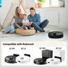 A family is sitting on the floor in a living room with a teepee in the background. Below them, there are images of robot vacuum cleaners and their accessories. Produktbild-Vorschau