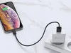 A smartphone is charging from a wall adapter plugged into a power strip. Náhled obrázku produktu