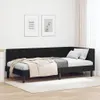 A black velvet corner bed frame with a headboard is shown in a room with two framed pictures on the wall and a white rug on the floor. Podgląd zdjęcia produktu