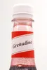 Close-up of the top of a bottle of Grenadine syrup. Anteprima dell’immagine prodotto