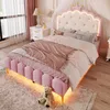 A child's bedroom with a pink bed, nightstand, and rug. Podgląd zdjęcia produktu