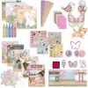 A collection of craft supplies and decorative elements for a children's creative box, featuring various themed scenes, stickers, crayons, and paper. Produktbild-Vorschau