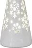 A close-up view of a white porcelain Christmas angel figurine with cut-out snowflake designs illuminated from within. Produktbild-Vorschau