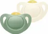 Two NUK pacifiers, one green and one cream colored, are shown against a white background. Produktbild-Vorschau