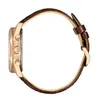 Side view of a men's watch with a brown leather strap and a gold-toned case. Anteprima dell’immagine prodotto