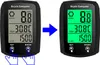 A comparison of a bicycle computer with a gray screen and a bicycle computer with a green screen, indicating a change or feature. Produktbild-Vorschau