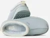 A pair of UGG Tazz slippers shown from a diagonal, slightly elevated angle against a white background. Produktbild-Vorschau
