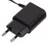 A black power adapter with two prongs for a European outlet. Náhľad obrázku produktu