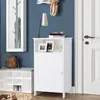 A white cabinet with a door and an open shelf is shown in a hallway next to a white shoe rack and a mirror with a coat rack. Produktbild-Vorschau