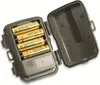 The image shows the inside of a trail camera with four AA batteries installed. Produktbild-Vorschau