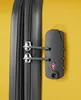 A close-up of a yellow suitcase with a TSA lock and zipper. Anteprima dell’immagine prodotto