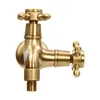 A brass water tap with two outlets on a white background. Podgląd zdjęcia produktu