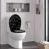 A toilet with a black and gold marble-patterned seat in a modern bathroom. Produktbild-Vorschau