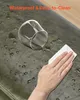 A hand is wiping water off a green surface with a white cloth, next to a clear glass that has spilled water around it. The text 'Waterproof & Easy-to-Clean' is overlaid on the image. Anteprima dell’immagine prodotto