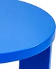 A close-up shot of the edge of a round, blue table. Produktbild-Vorschau