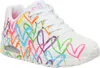 A white Skechers sneaker with a colorful heart print. Voir les images du produit