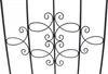 A close-up view of a black metal garden trellis with decorative scrollwork. Náhľad obrázku produktu
