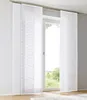 A window with white panel curtains with a wave pattern. Produktbild-Vorschau