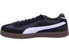 Side view of a black Puma sneaker with a white stripe and a brown sole. Voir les images du produit