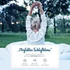 A woman stretching in bed outdoors, with text and icons describing sleep climate. Produktbild-Vorschau