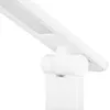 A close-up shot of a white LED desk lamp, focusing on the adjustable joint and the light panel. Produktbild-Vorschau