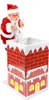 A Santa Claus figurine is shown climbing into a chimney decoration. Voir les images du produit