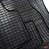 A close-up view of black rubber car floor mats with a grid pattern. Produktbild-Vorschau