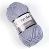 A ball of gray yarn with a label. Produktbild-Vorschau