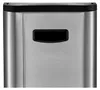 A close-up, front view of a stainless steel trash can with a black lid and a black handle. Podgląd zdjęcia produktu