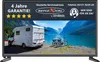 A television screen displaying a promotional image of a campervan and bicycles by a lake, with text overlays advertising warranty and contact information. Voir les images du produit