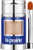A product shot of a La Prairie Skin Caviar Concealer Foundation SPF 15 with an applicator brush. Produktbild-Vorschau