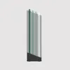 A set of four cutting boards in varying shades of green and white, standing upright in a dark gray holder. Anteprima dell’immagine prodotto