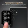 A close-up of a phone's camera lens protector being applied to a smartphone. Produktbild-Vorschau