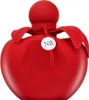 A red perfume bottle with a round cap and petal-like accents around the neck. A small white tag with 'NR' printed on it hangs from the neck with a string. Voir les images du produit