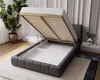 A bed with its storage compartment open, showing the mattress frame and storage space. Náhled obrázku produktu